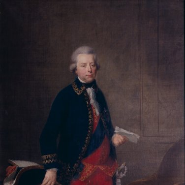Stadhouder Willem V leunt tegen een bureau aan.